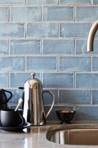 Powder Blue Subway Tiles Paired with Gray Grout