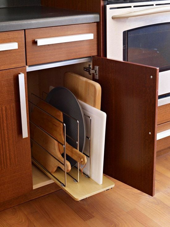 A pull-out drawer helps keep cutting boards and cookie sheets organized and easy to reach