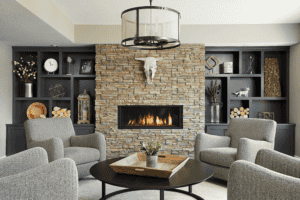 Linear Fireplace with Stone Surround and Custom Charcoal Grey Bookshelves