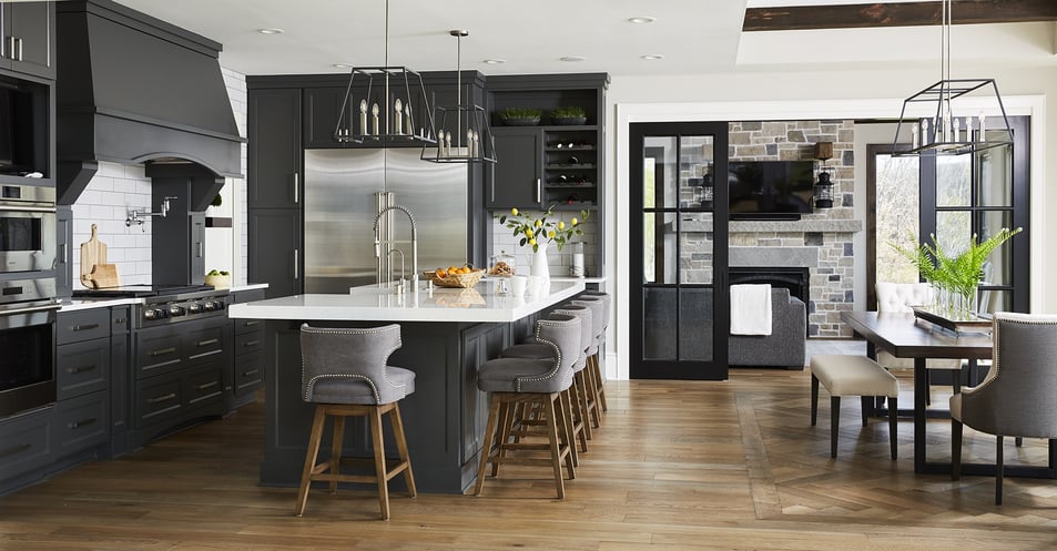 Lake House Kitchen with Charcoal Cabinets and wood flooring