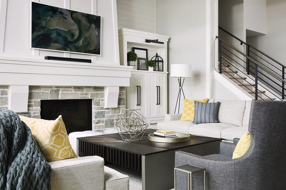 Modern farmhouse stone fireplace, horizontal black raining, white built in cabinets tv