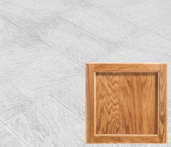 Update your flooring with oak cabinets-patterned light grey tiled floor with honey oak.