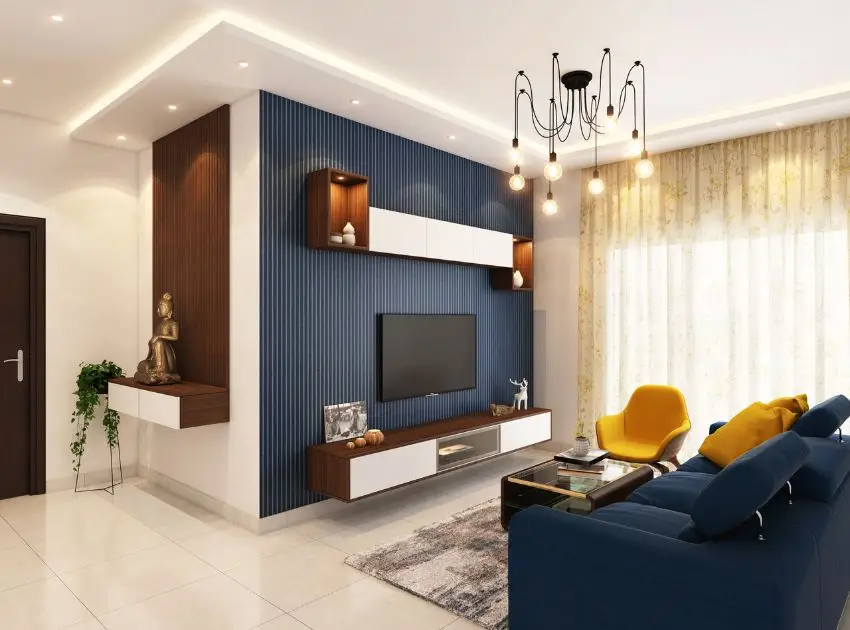 Vertical paneling, floor to ceiling sheer drapery, and the many levels of accent lighting draw your eye upward in this family room