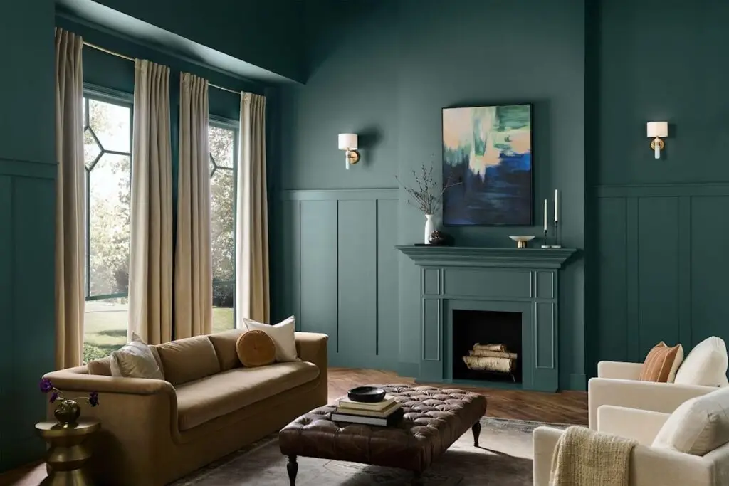 behr hidden gem color of the year 2026 painted on living room walls and fireplace mantel