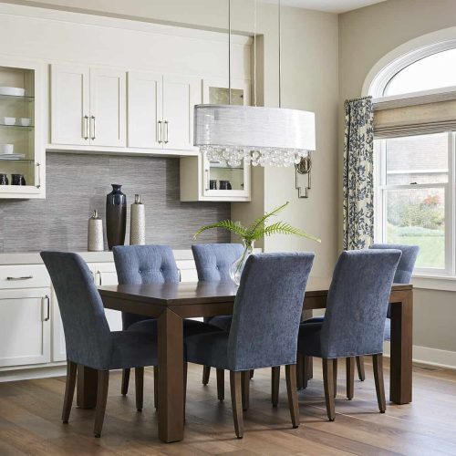 Floral curtains for blue and white formal dining room
