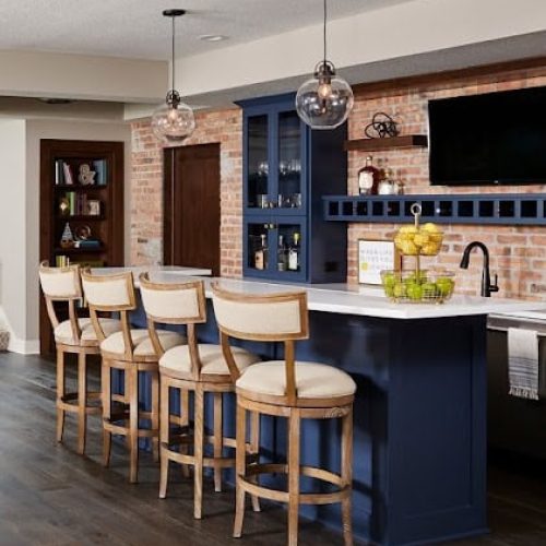 navy blue bar with bold accent brick wall